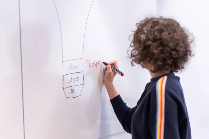Coache qui donne des conseils et explications à son coaché